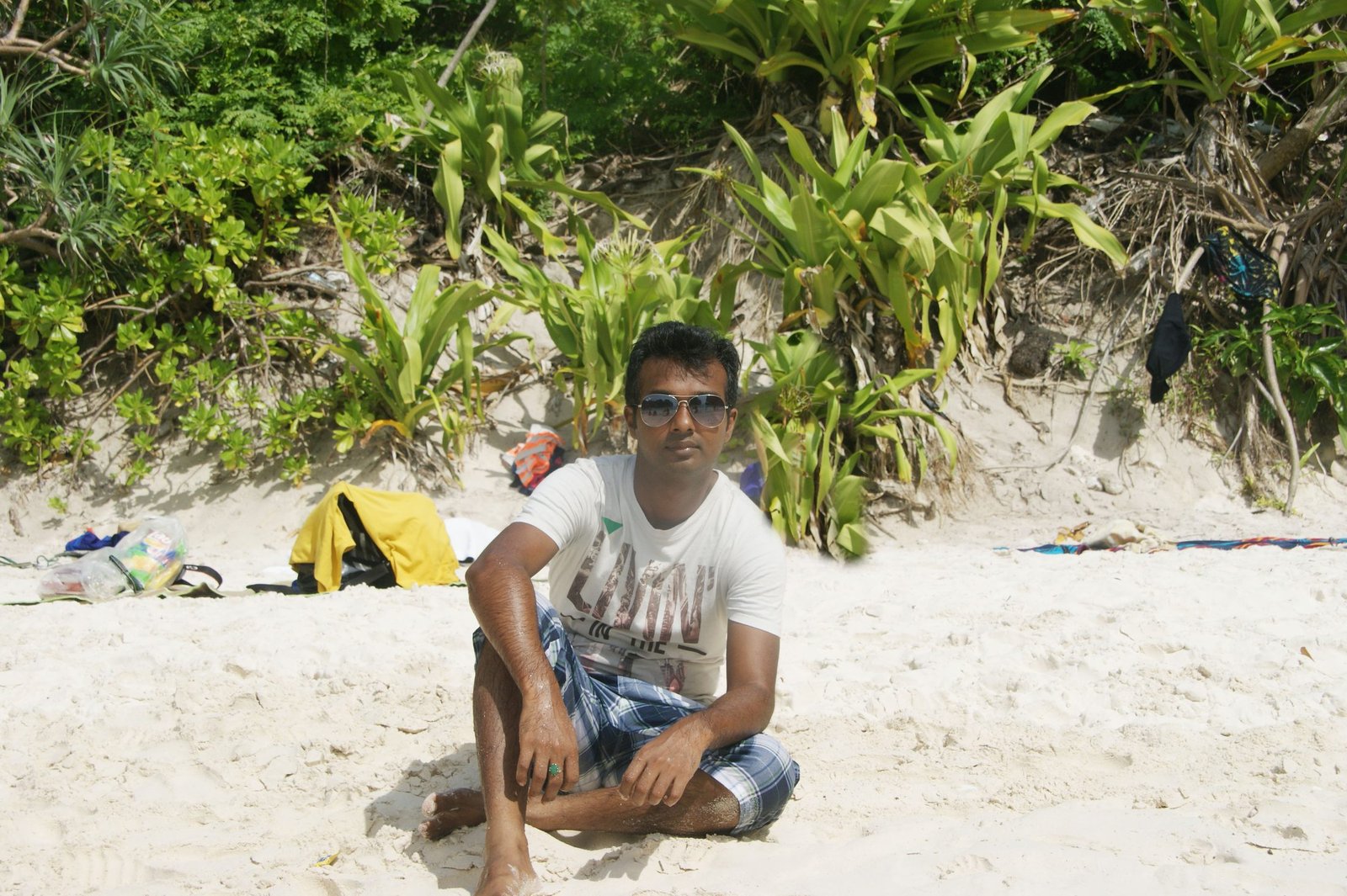 Rajib relaxing on a beach in Thailand